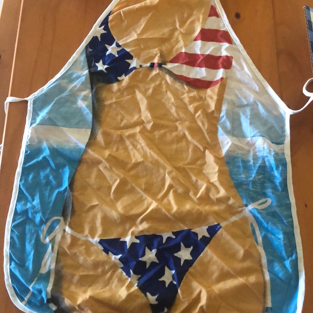 Apron with American flag bikini body.